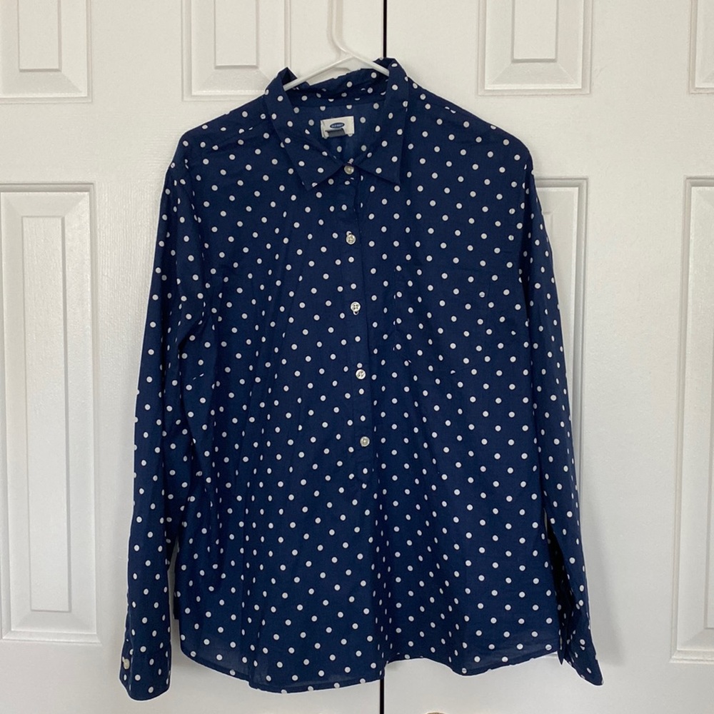 Navy blue with white polka dot blouse.